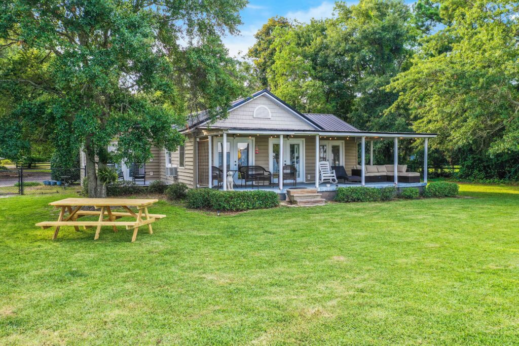 Front Image of Vacation Rental House: Swimmin’ Hole 2 - lakefront getaway with back porch living, dock & boat launch