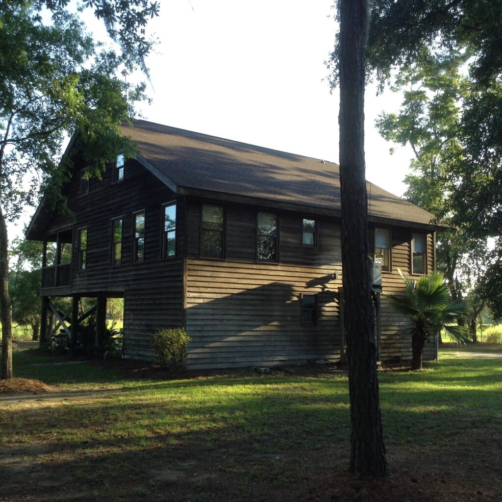 Image of the "Come Enjoy Paradise With On-Site Dock And Lovely Sunsets", waterfront vacation rental home on Edisto Island, South Carolina.