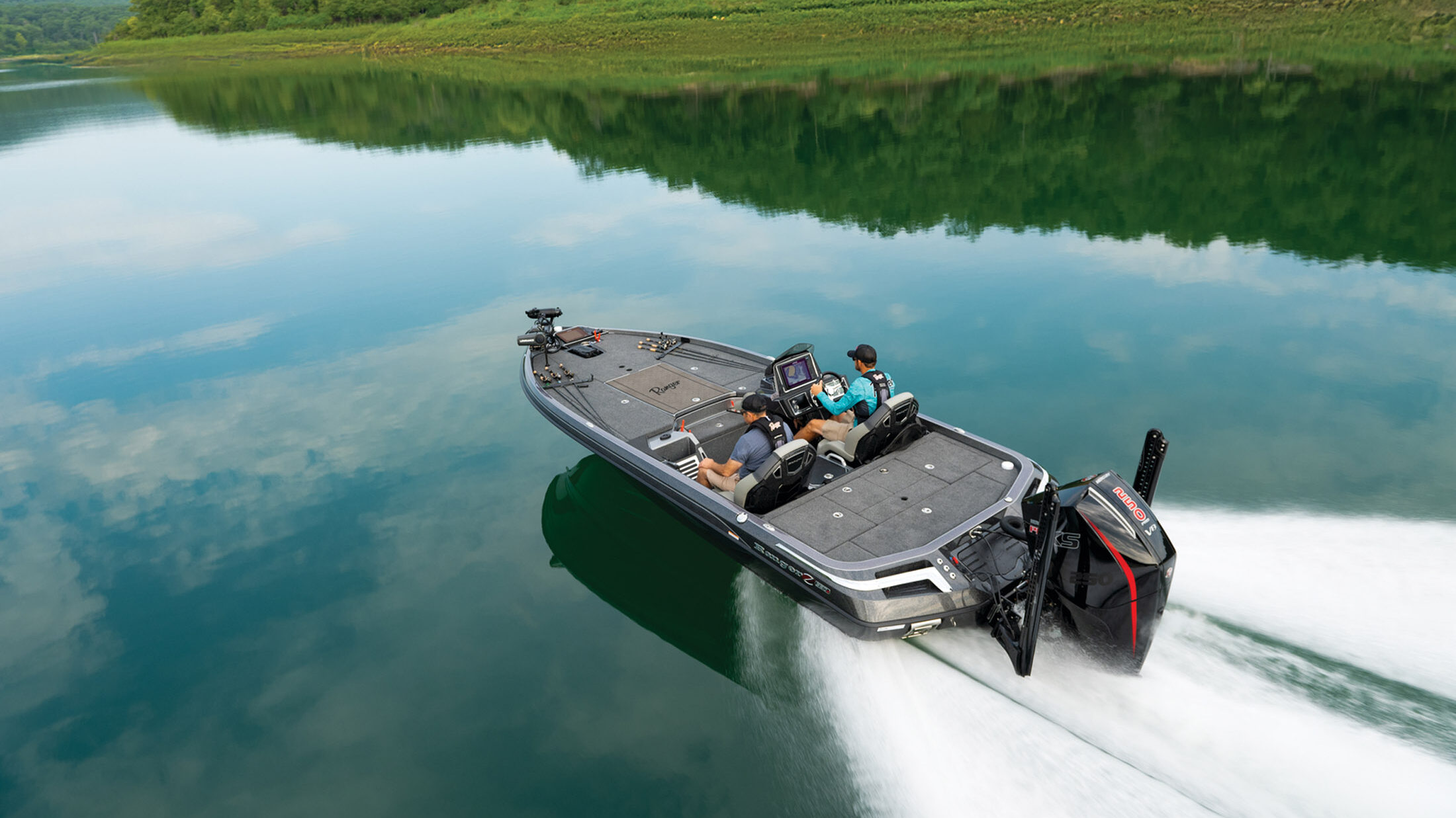 Overhead view of the Ranger Z520R as it drives over a pristine lake.