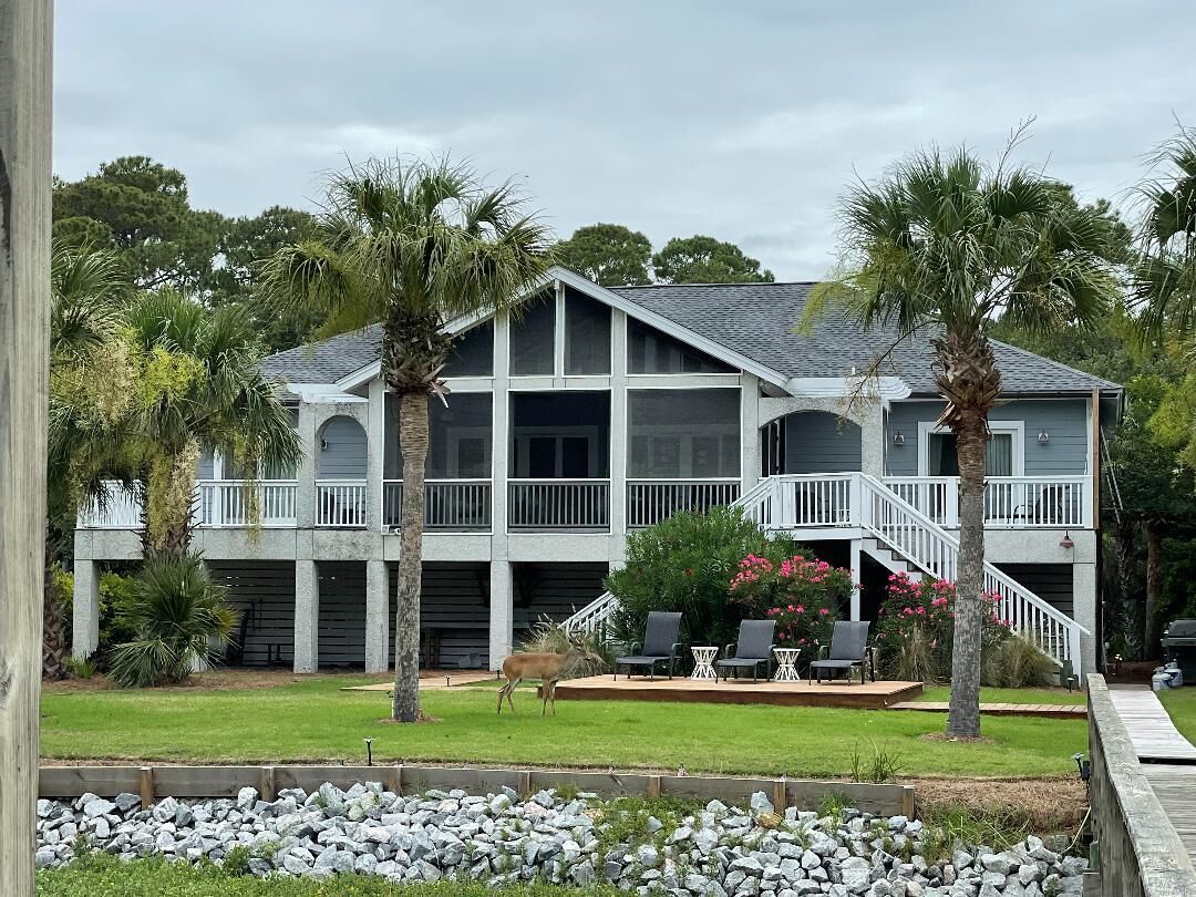 Spectacular 5-Star on the creek home, 6 cards and Golf Cart with full week stay Spectacular 5-Star on the creek home, 6 cards and Golf Cart with full week stay