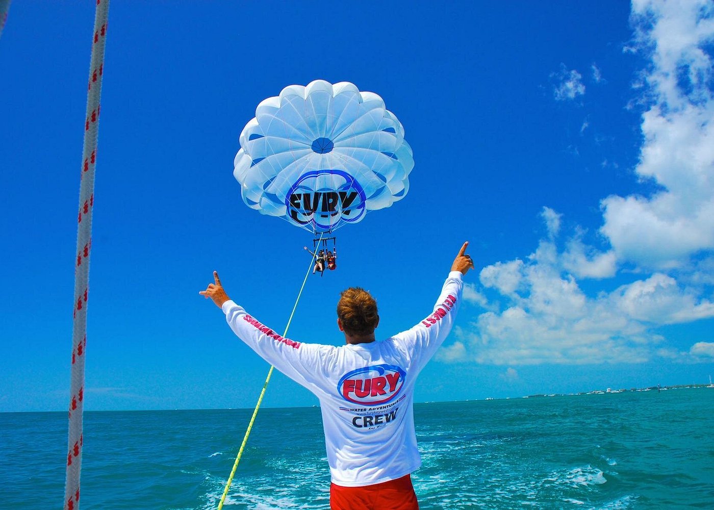 Key West Parasailing Adventure above Emerald Blue Waters Key West Parasailing Adventure above Emerald Blue Waters