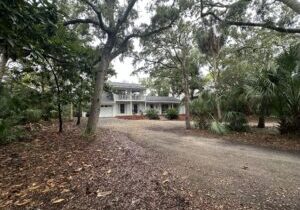 Secluded retreat with private dock and fire pit. Only steps from the beach!